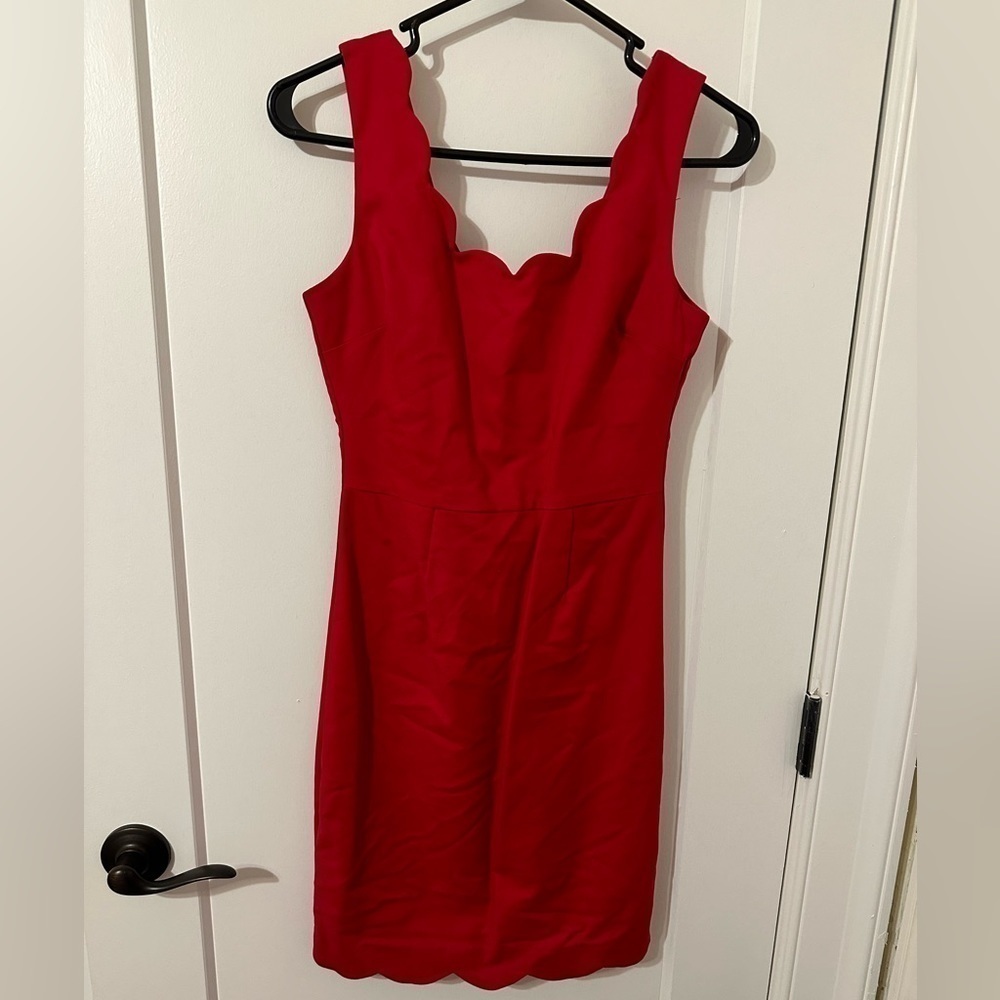 Red dress! Mid length and lined stretchy material!